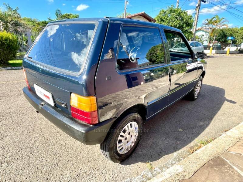 FIAT - UNO - 2003/2004 - Azul - R$ 15.900,00