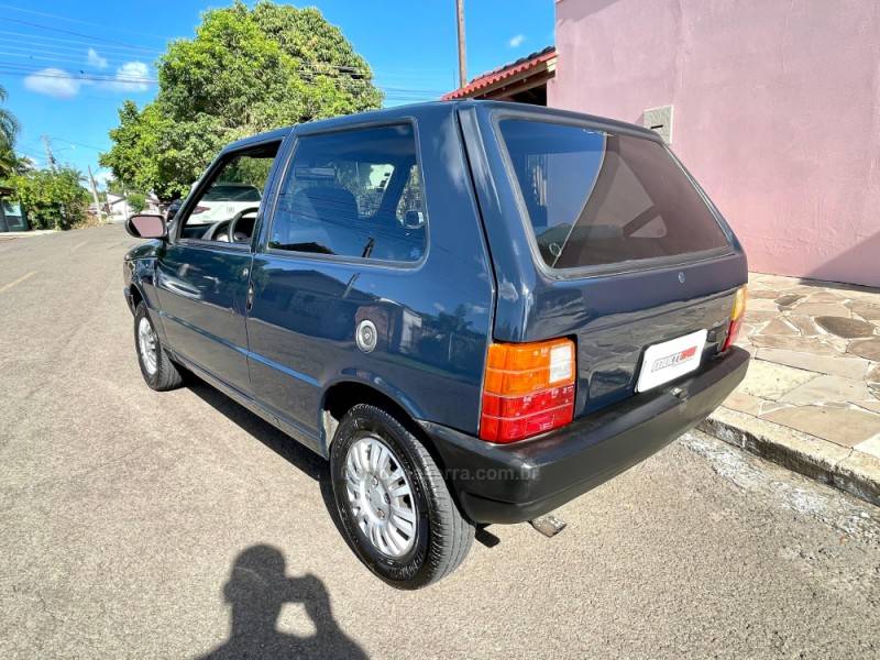 FIAT - UNO - 2003/2004 - Azul - R$ 15.900,00